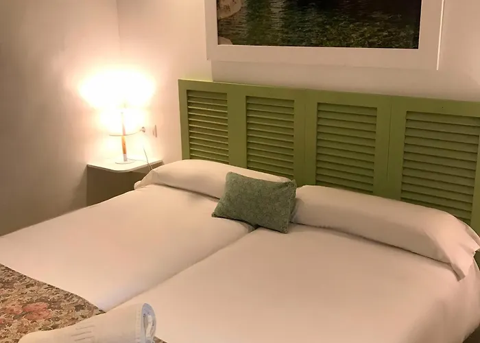 Hotel cerca del colegio: Leon Dormido Rooms & Apartments